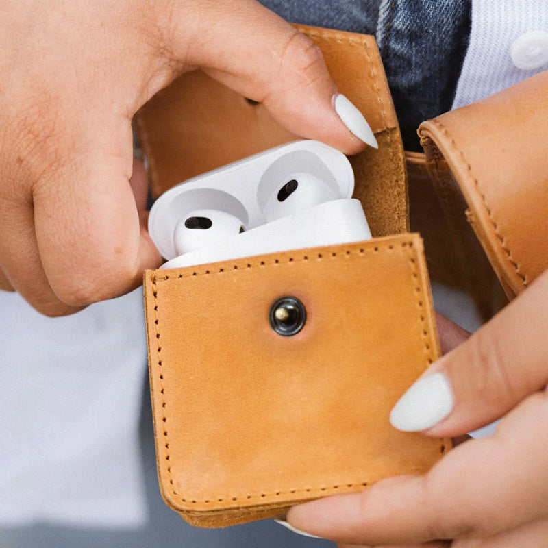 Closeup of Airpods in Airpod case from Elevate