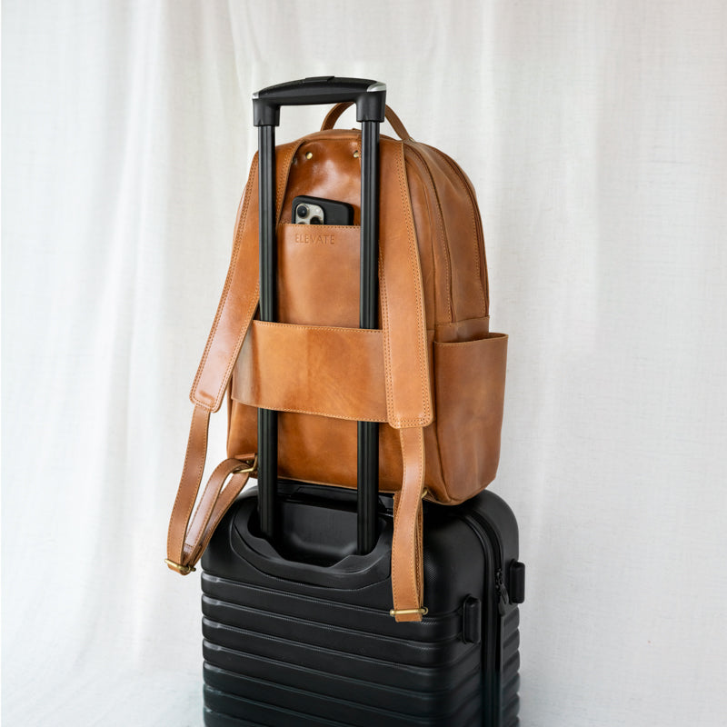 Elevate Commuter Backpack on luggage