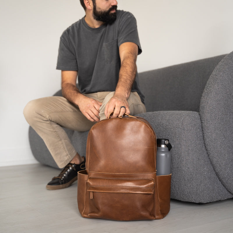 Man with Elevate Commuter Backpack in Chestnut