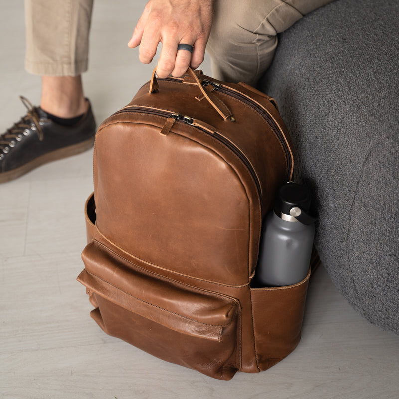 Man with Elevate Commuter Backpack in Chestnut