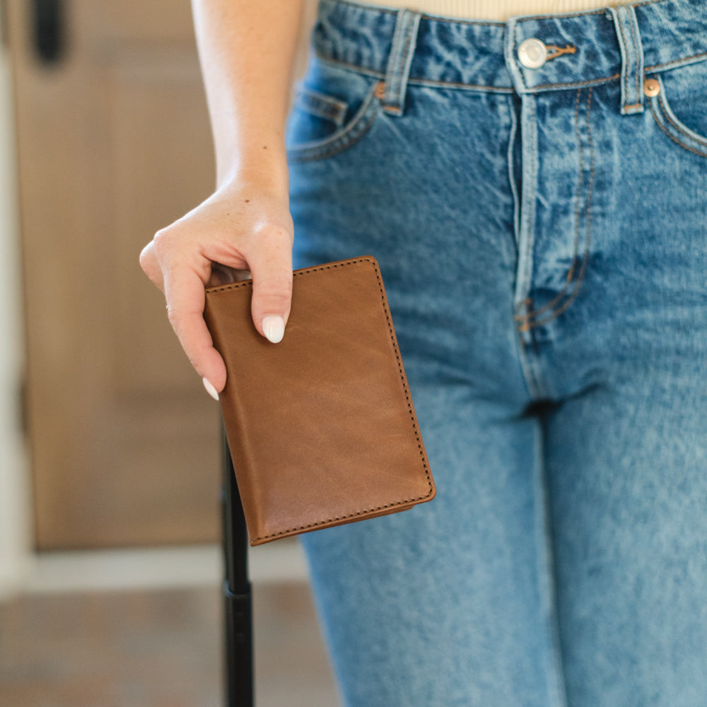 Woman holding Passport Wallet by Elevate