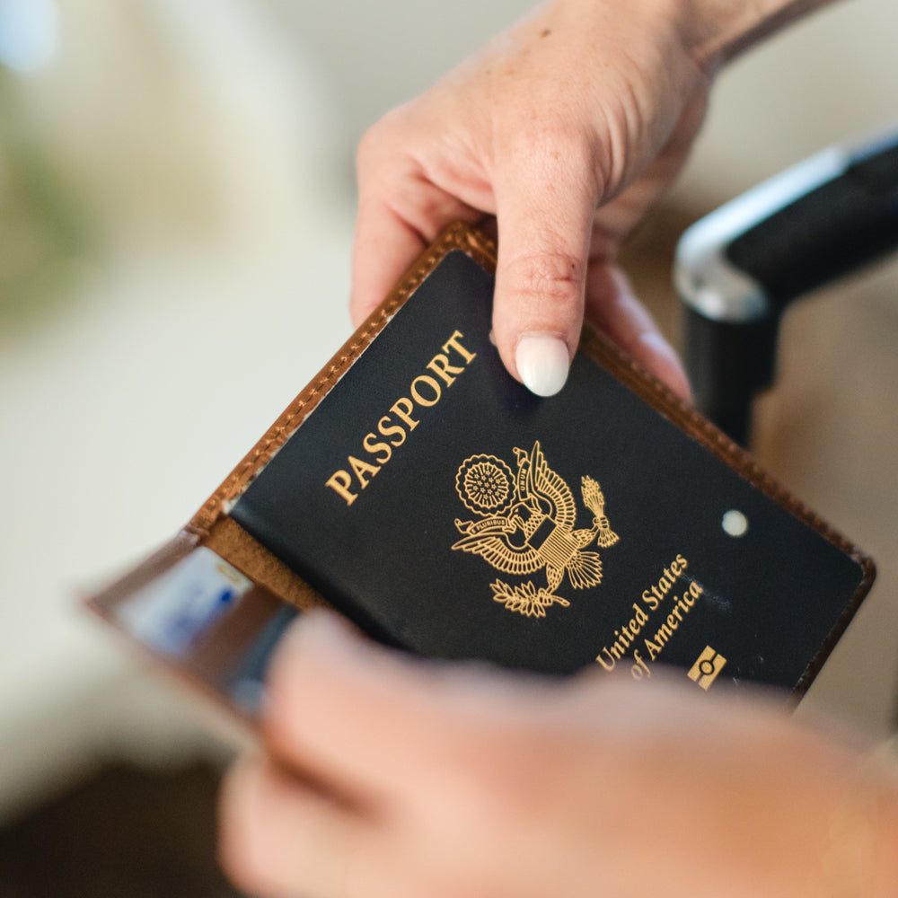 Woman holding Passport Wallet by Elevate 