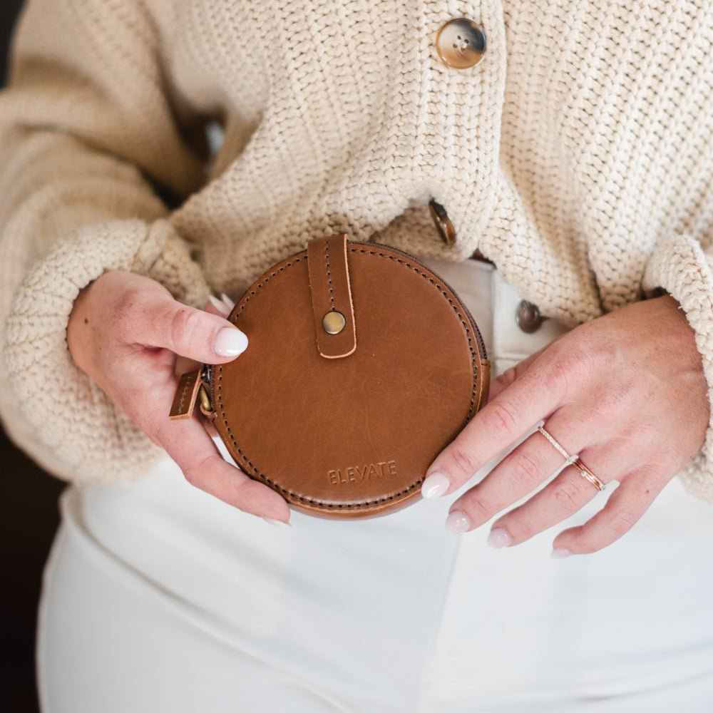 Woman holding Elevate Coin Purse 